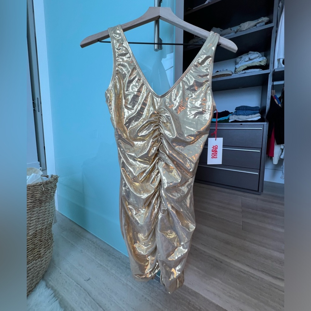 Solid and stripe gold bodycon dress size M